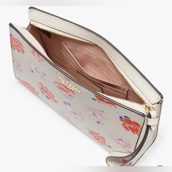 Morgan Dotty Floral Embossed Gusseted
Wristlet Kate spade SOLD OUT!! New w tags - Picture 4 of 6